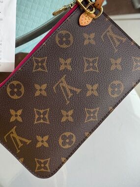 Louis Vuitton Monogram Canvas Wristlet with Pink Trim new